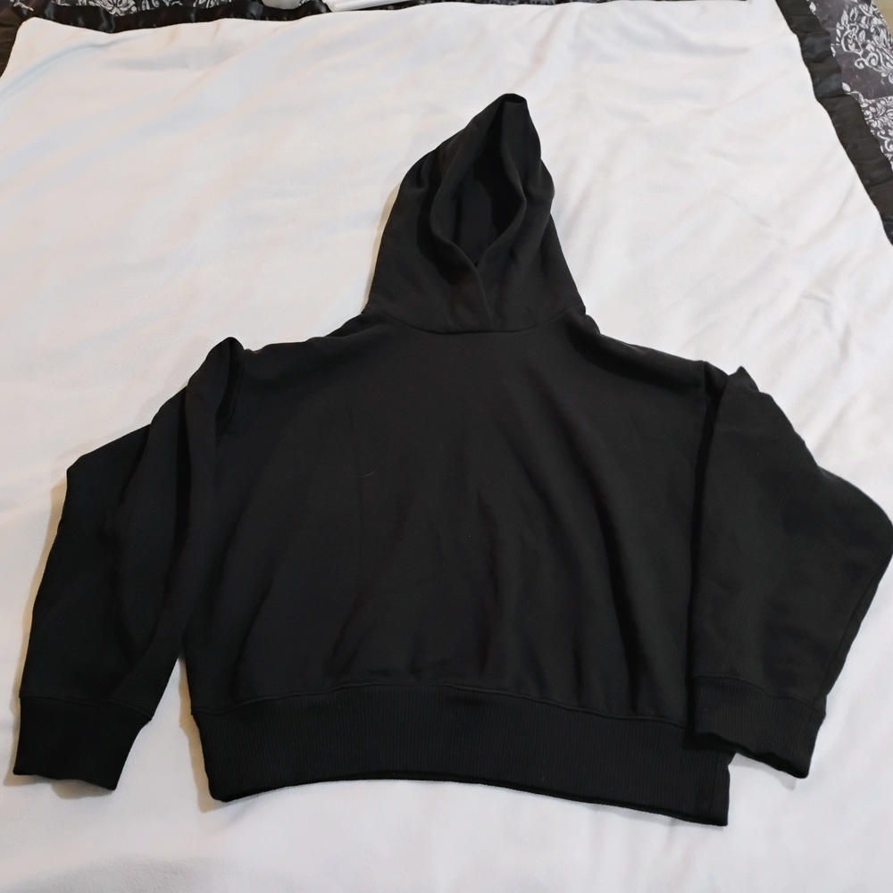 a new day Cozy Black Sweatshirt